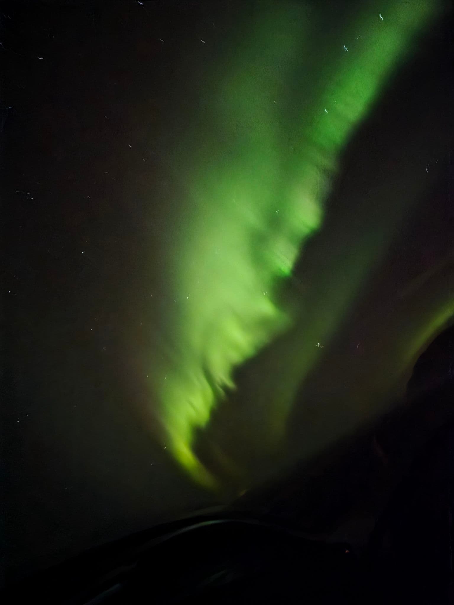 Northern lights photographed by Bass in Vík